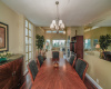 This formal dining area overlooks the private patio as well as the ocean