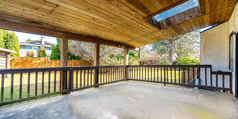 Massive covered sundeck with nice wood finished ceiling and skylight, perfect for year round enjoyment!