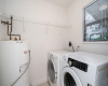 LAUNDRY ROOM AND HOT WATER TANK 5 YRS OLD