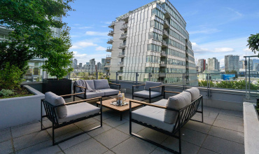 Spacious, private, with views of False Creek Inlet, the city and mountains